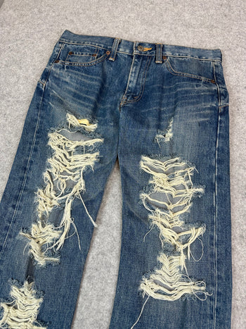 Women’s Junya Watanabe Comme Des Garcons Distressed Denim Pants
