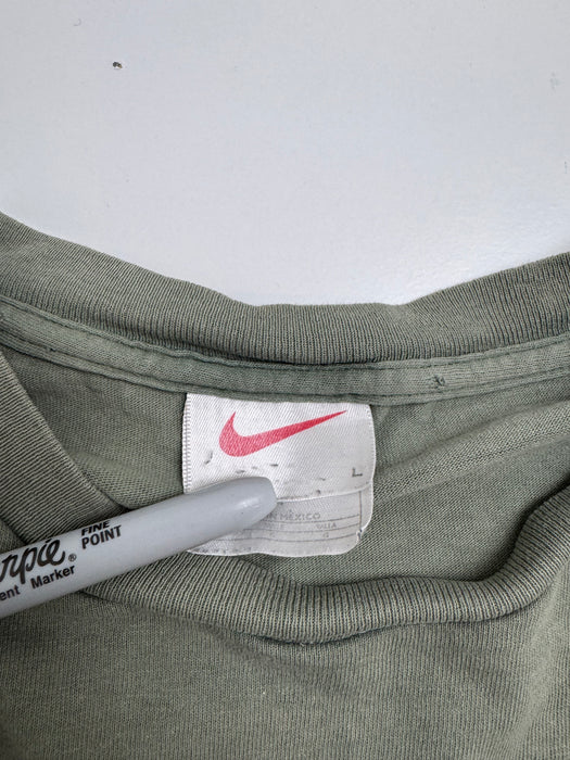 Vintage 90s Nike Faded Pistachio Green Tee | Vitnage Clothing Store Canada