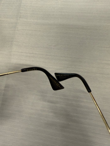 Gucci GG0061S Round Metal Sunglasses