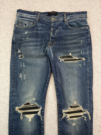 Amiri Ripped Ribbed Denim Jeans (USED)