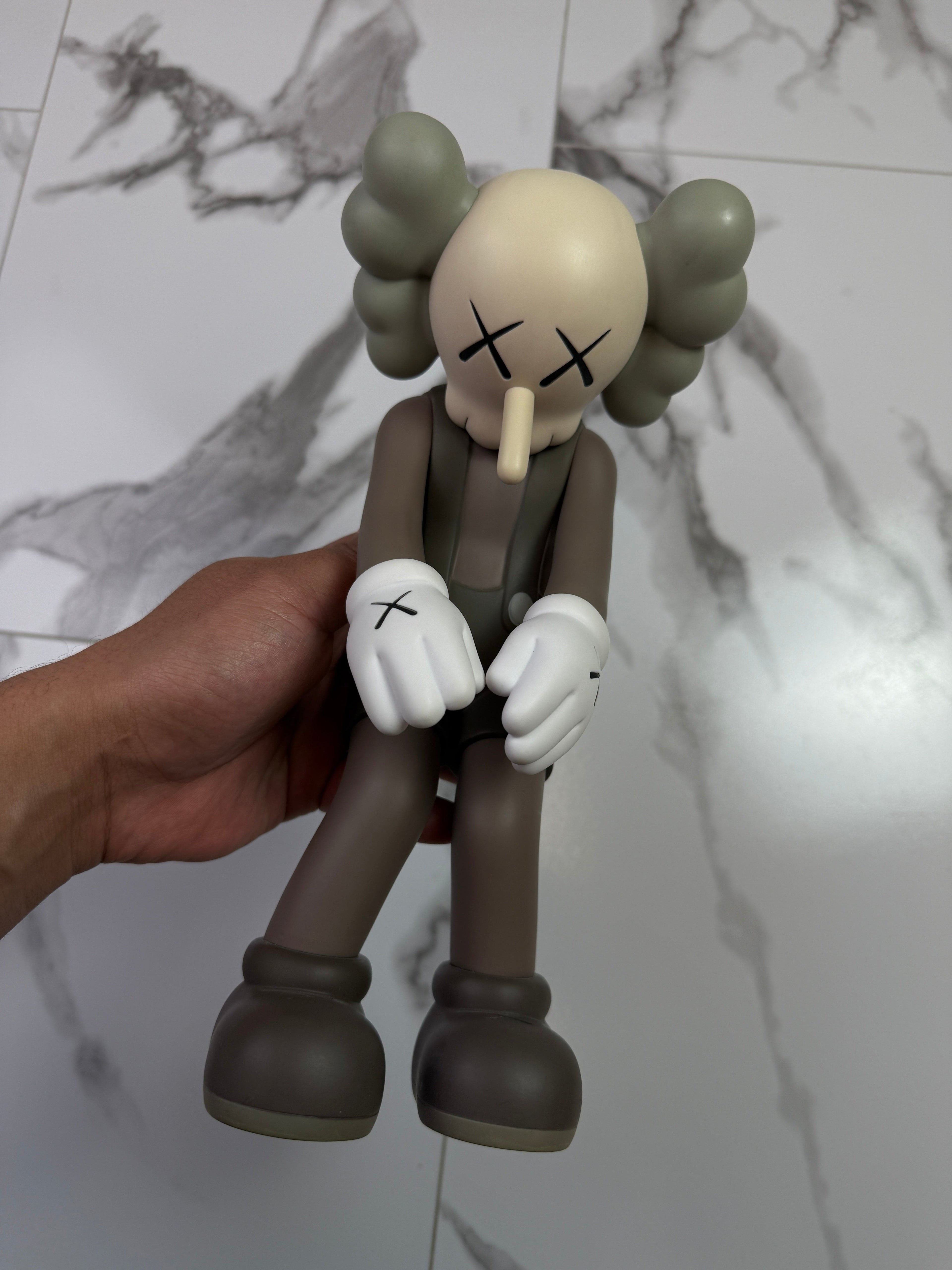 KAWS Small Lie Companion Vinyl Figure Brown