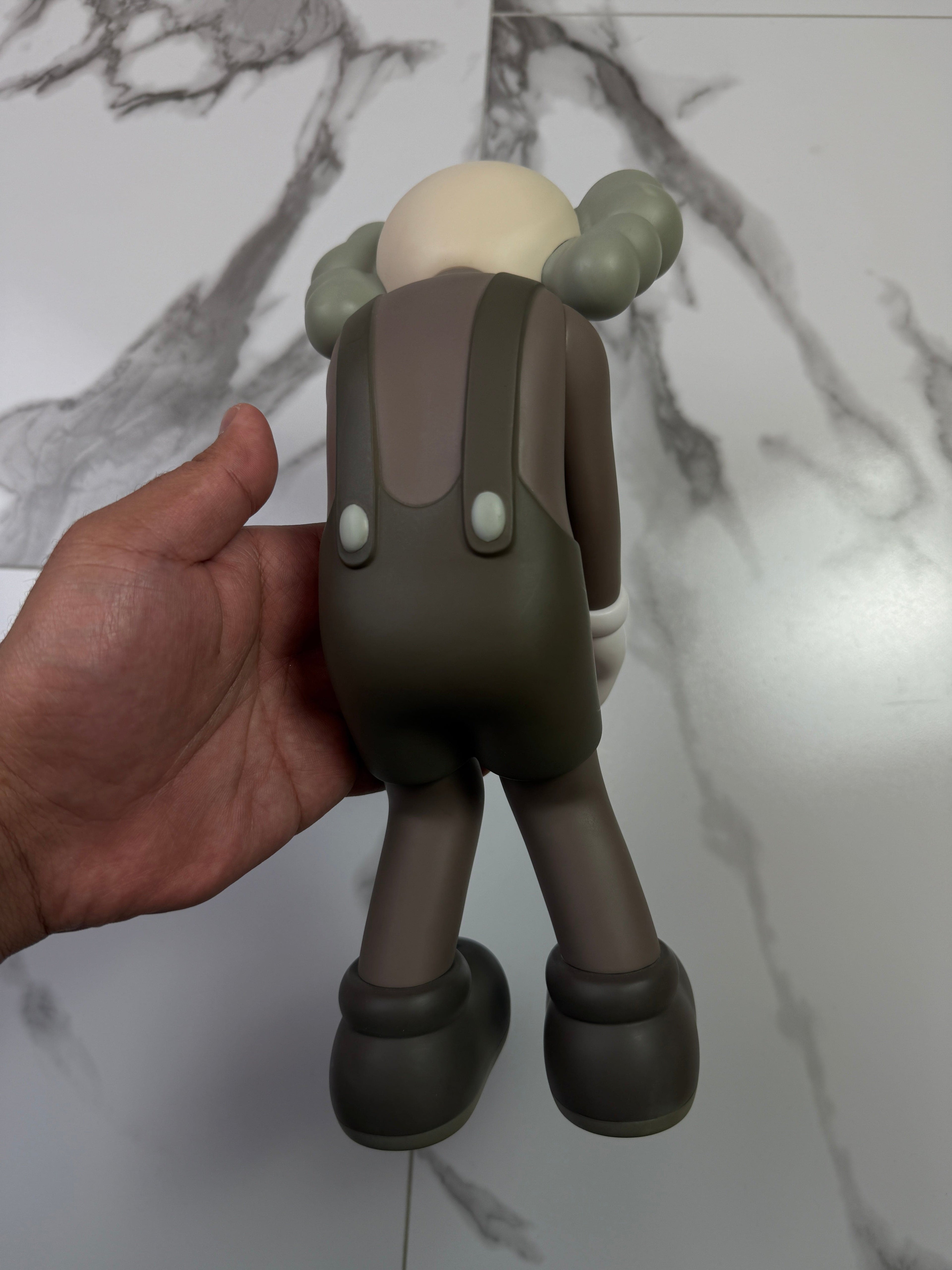 KAWS Small Lie Companion Vinyl Figure Brown