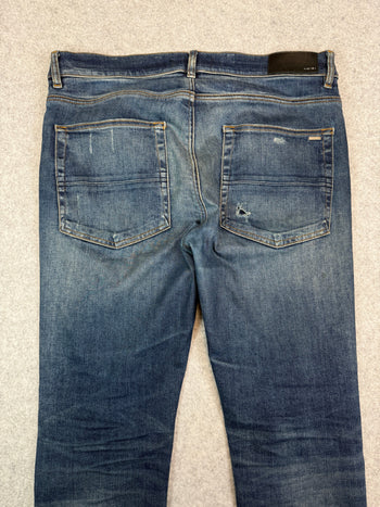 Amiri Ripped Ribbed Denim Jeans (USED)