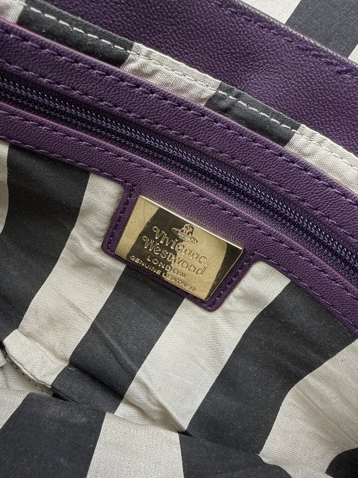 Vivienne Westwood Embossed Orb Logo Clutch Bag Purple