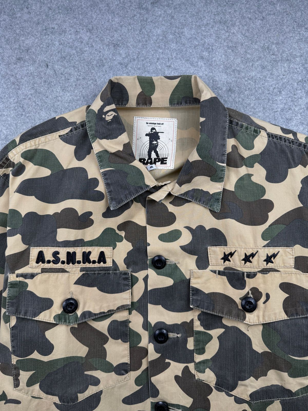 BAPE A.S.N.K.A. 1st Camo Military Button-Up Longsleeve (USED)